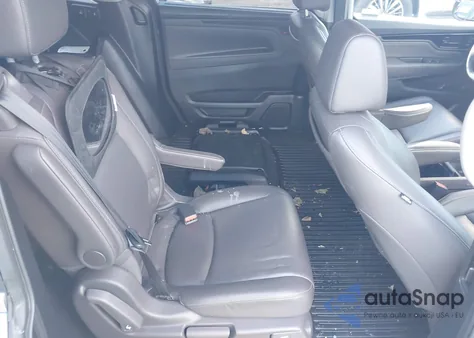 2021 Honda Odyssey Touring from USA, damaged, VIN 5FNRL6H87MB009491